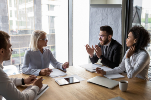 Use of holding companies and ownership of trading premises